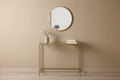 Consola dorada ginkgo vista completa con base y patas - entrada beige